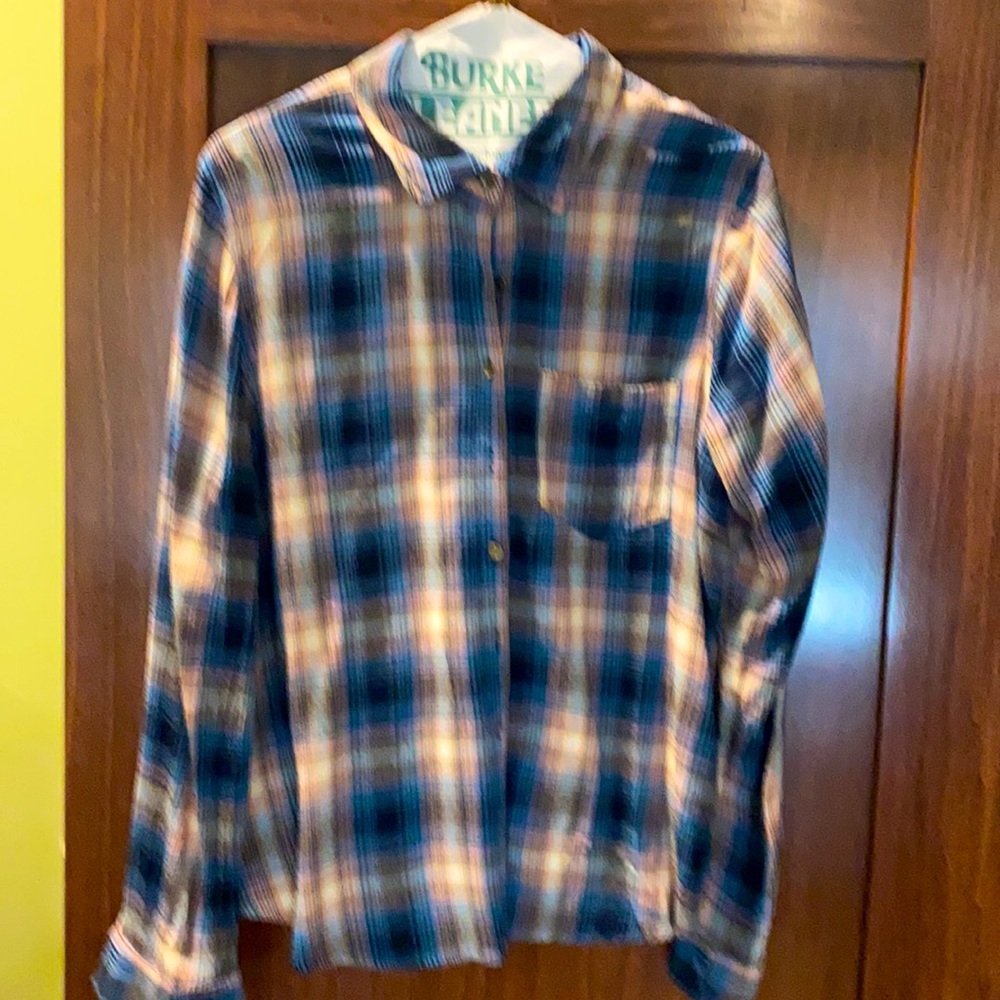 Blue and peach button down shirt.